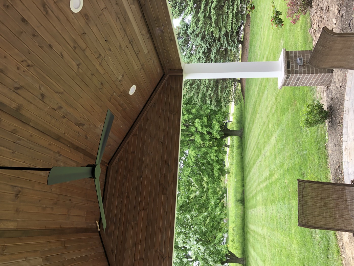 Covered porch with wood ceiling
