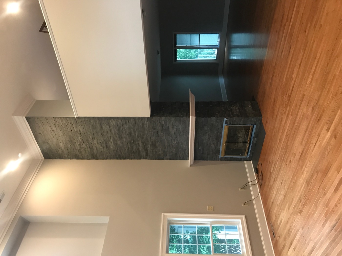 Floor-to-ceiling stone fireplace