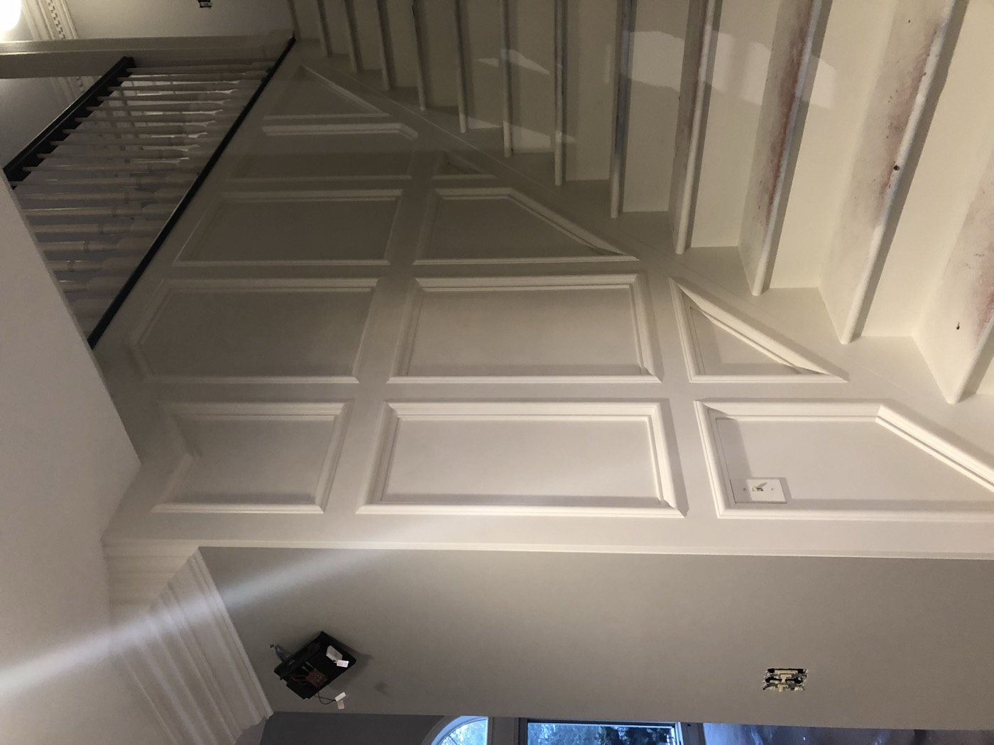 Custom paneled stairwell millwork